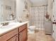 Bathroom with a vanity, and a shower with patterned curtain at 609 Eskimo Ct, Cts, Hampton, GA 30228