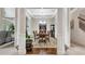 Elegant dining room features tray ceiling, hardwood floors, and classic furnishings perfect for entertaining guests at 609 Eskimo Ct, Cts, Hampton, GA 30228