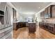 Spacious kitchen boasts stainless steel appliances, ample cabinet space, and a functional center island at 609 Eskimo Ct, Cts, Hampton, GA 30228