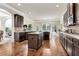 Gourmet kitchen with granite counters, an island, and top-of-the-line stainless steel appliances, perfect for any cook at 609 Eskimo Ct, Cts, Hampton, GA 30228