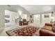 Cozy living room with leather furniture, an area rug, and neutral walls at 609 Eskimo Ct, Cts, Hampton, GA 30228