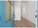 Inviting entryway with wood-look flooring, showcasing bright, neutral walls and natural light at 683 Summitt Hill Way, Cumming, GA 30040
