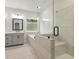 Main bathroom showcasing double sink vanity, soaking tub, and walk in shower at 683 Summitt Hill Way, Cumming, GA 30040