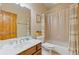 Bathroom featuring a white vanity, framed mirror, toilet, and shower with curtain at 755 Peninsula Overlook, Hampton, GA 30228