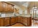 Well-appointed kitchen with granite countertops, custom cabinets, and a breakfast nook at 755 Peninsula Overlook, Hampton, GA 30228