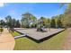 Community playground with swings and slide, perfect for outdoor fun and recreation at 755 Peninsula Overlook, Hampton, GA 30228