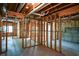 Unfinished basement framed for future rooms with visible utilities, ready for customization at 1052 Secret Ne Trl, Sugar Hill, GA 30518
