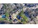 Aerial view of a home, set in a well-planned community, boasting a view of the nearby pond at 1081 Talon Trce, Lawrenceville, GA 30043