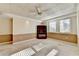 Finished basement with neutral carpet, paneled walls, and a functional layout at 1081 Talon Trce, Lawrenceville, GA 30043