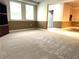 Spacious finished basement with neutral carpeting and plenty of room for recreation and storage at 1081 Talon Trce, Lawrenceville, GA 30043