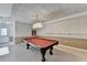 View of a basement featuring a red pool table and tiled floors at 1081 Talon Trce, Lawrenceville, GA 30043