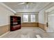 View of the basement featuring neutral walls and a dark wood bookcase at 1081 Talon Trce, Lawrenceville, GA 30043