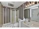 View of a full bathroom featuring a shower and vanity at 1081 Talon Trce, Lawrenceville, GA 30043