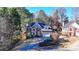 Beautiful two-story brick home with a well-manicured front yard, lush landscaping, and a welcoming driveway at 1081 Talon Trce, Lawrenceville, GA 30043