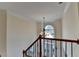 Foyer with decorative chandelier and large window providing lots of natural light at 1081 Talon Trce, Lawrenceville, GA 30043