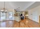 Open kitchen featuring granite countertops, an island, and stainless steel appliances at 1081 Talon Trce, Lawrenceville, GA 30043