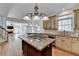 Spacious kitchen with a large island, stainless steel appliances, and ample cabinet space at 1081 Talon Trce, Lawrenceville, GA 30043