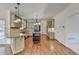 Gourmet kitchen featuring granite countertops, stainless appliances, and a large center island at 1081 Talon Trce, Lawrenceville, GA 30043