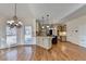 Spacious kitchen with granite countertops, stainless steel appliances, and a wine rack island at 1081 Talon Trce, Lawrenceville, GA 30043