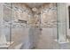 Detailed view of the shower with tile backsplash and dual shower heads at 1081 Talon Trce, Lawrenceville, GA 30043