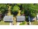 An aerial view of a home with a spacious, tree-lined backyard at 1425 Parkmont Dr, Roswell, GA 30076