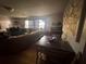 Comfortable living room featuring hardwood floors, natural light, and a cozy dining space at 1425 Parkmont Dr, Roswell, GA 30076
