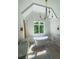 Bathroom with a vaulted ceiling, soaking tub, double vanity and a view to the backyard at 2461 Fernleaf Nw Ct, Atlanta, GA 30318
