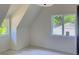 Bright bedroom featuring natural light from two windows and neutral wall coloring at 2461 Fernleaf Nw Ct, Atlanta, GA 30318