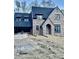 New two-story brick home with dormers and attached garage at 2461 Fernleaf Nw Ct, Atlanta, GA 30318