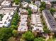 Aerial view showcasing buildings surrounded by mature trees in a vibrant community setting at 273 12Th Ne St # 313, Atlanta, GA 30309