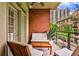 Inviting balcony featuring comfortable outdoor seating and views of lush trees and architecture at 273 12Th Ne St # 313, Atlanta, GA 30309