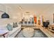 Open living space with modern kitchen, sleek appliances, and a casual seating area at 273 12Th Ne St # 313, Atlanta, GA 30309