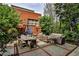 Serene outdoor patio area complete with comfortable seating and lush greenery at 273 12Th Ne St # 313, Atlanta, GA 30309