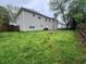 Large backyard with a wooden fence at 3472 Riverview Chase Way, Ellenwood, GA 30294