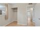 Empty bedroom featuring tiled flooring, neutral walls, and a closet at 6337 Ansel Ct, Buford, GA 30518