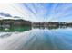 Scenic lake view showcasing the expansive water and picturesque shoreline, ideal for nature lovers at 6337 Ansel Ct, Buford, GA 30518