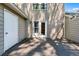 Back patio featuring gray decking and access to the building and backyard at 706 Twin Brooks Se Ct, Marietta, GA 30067