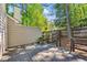 Wooden backyard deck with wooden railing and a view of the yard with a fence at 706 Twin Brooks Se Ct, Marietta, GA 30067