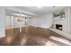 Spacious basement with dark wood floors and a cozy fireplace at 706 Twin Brooks Se Ct, Marietta, GA 30067