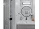 Bathroom features a modern sink with a round mirror and stylish decor at 706 Twin Brooks Se Ct, Marietta, GA 30067