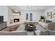 Living room featuring a fireplace, stylish decor, and ample seating for guests at 706 Twin Brooks Se Ct, Marietta, GA 30067