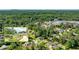 Aerial view of a home with a well-kept yard and close to wooded area with mountain views at 1081 Singleton Valley Cir, Norcross, GA 30093