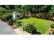 Large, level backyard with shed, mature trees, and a neatly maintained lawn at 1081 Singleton Valley Cir, Norcross, GA 30093