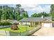 A well-maintained single-Gathering home with a classic design and neatly landscaped front yard at 1081 Singleton Valley Cir, Norcross, GA 30093