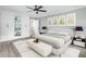 Serene main bedroom with a ceiling fan, closet, and an ensuite bathroom at 1248 Reilly Ln, Clarkston, GA 30021