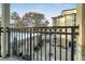Apartment balcony overlooking beautifully maintained courtyard with manicured landscape at 2230 Cheshire Bridge Rd # 412, Atlanta, GA 30324