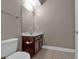 Small bathroom featuring vanity, sink, mirror, toilet and tile floors at 2230 Cheshire Bridge Rd # 412, Atlanta, GA 30324