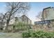 A gated community in a suburban neighborhood with mature trees and well-maintained landscaping at 2230 Cheshire Bridge Rd # 412, Atlanta, GA 30324