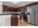 Modern kitchen featuring stainless steel appliances, gorgeous countertops, and wood cabinets at 2230 Cheshire Bridge Rd # 412, Atlanta, GA 30324