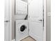 Convenient in-unit laundry closet with stacked washer and dryer at 2230 Cheshire Bridge Rd # 412, Atlanta, GA 30324
